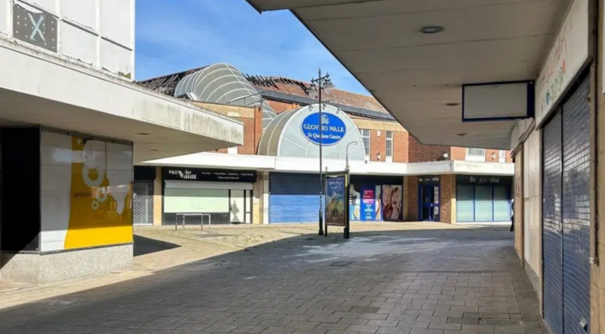 Image of an empty pedestrianised high street outside Glovers Walk shopping centre