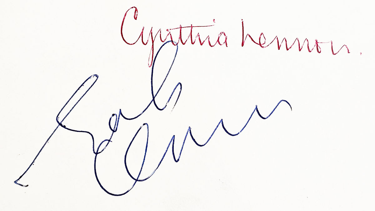 John Lennon's autograph in blue biro and Cynthia Lennon's autograph in red biro