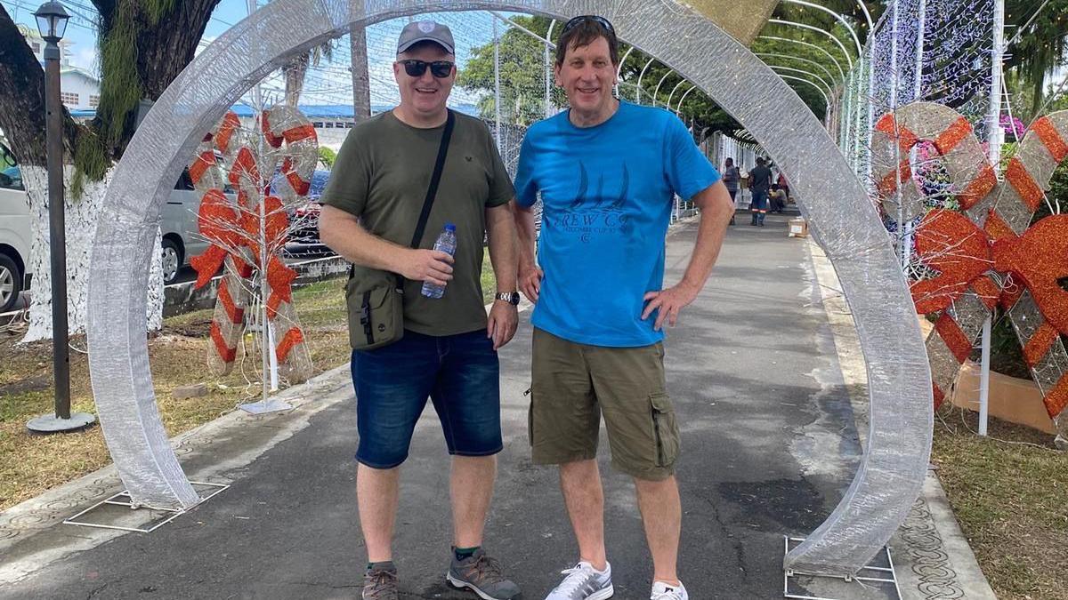 Hampshire fan Alan Davis (left) poses for a photo with Kevan James (right) 