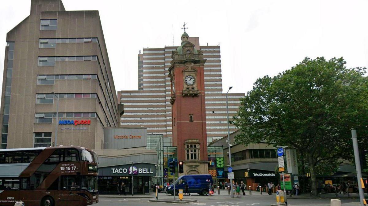 Streetview image of the clocktower and Victoria shopping centre