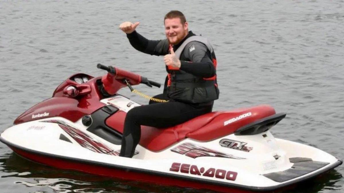 Tom Ellis on a jet ski