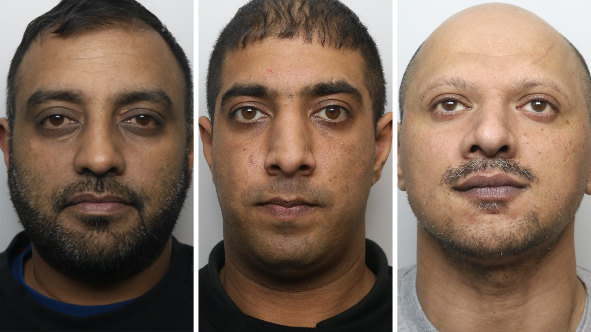Three custody photos. On the left is a man in a dark top with short dark hair, a short dark beard and moustache and brown eyes. In the middle is a man with dark hair and brown eyes, wearing a black top. On the right is a man with a bald head, a moustache and brown eyes, wearing a grey top.