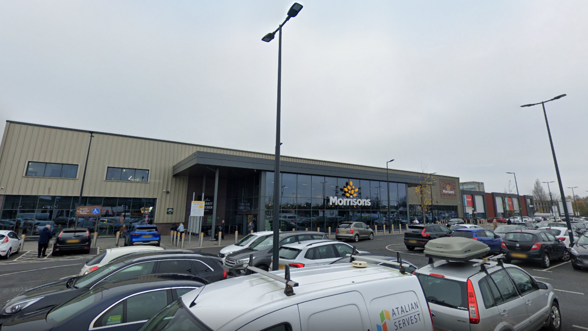 A general view of the Morrisons store in Kirkby, Merseyside. It is a glass-fronted building, including the Morrisons' logo, seen from the car park.