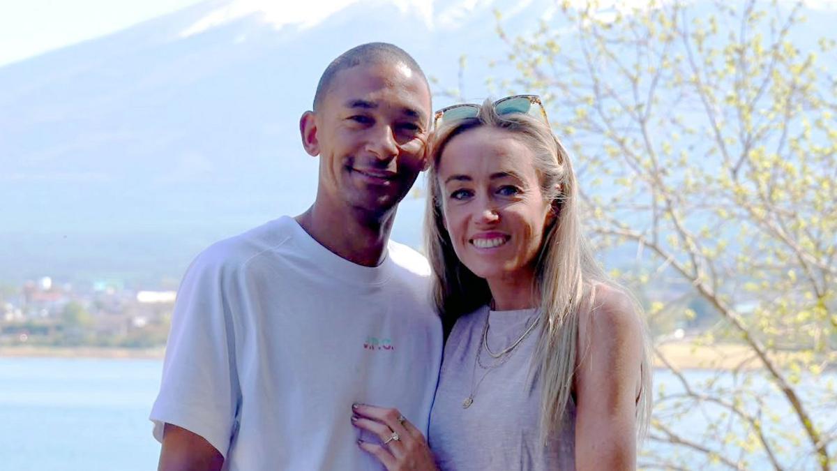 Michael Rimmer and Eilish McColgan smile while looking into the camera, shortly after getting engaged.
