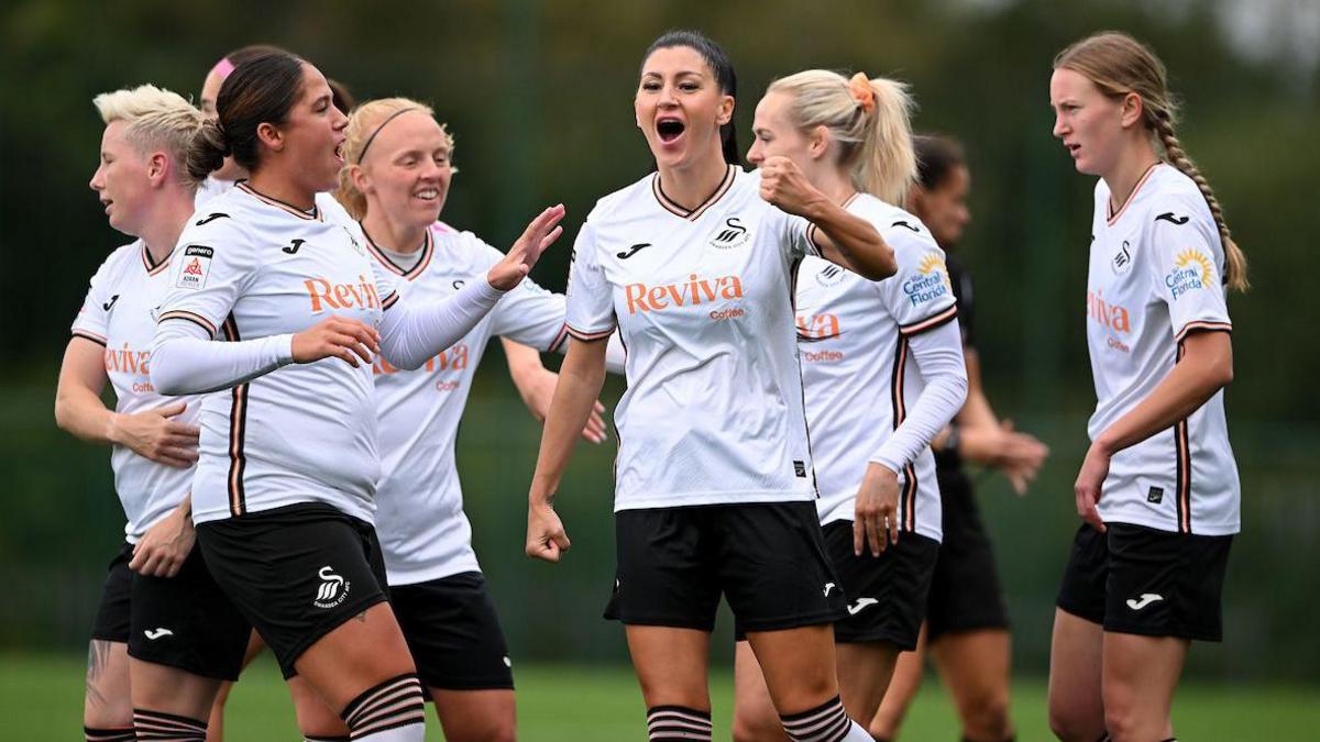 Danielle Broadhurst celebrates scoring on her Swansea debut with her team-mates