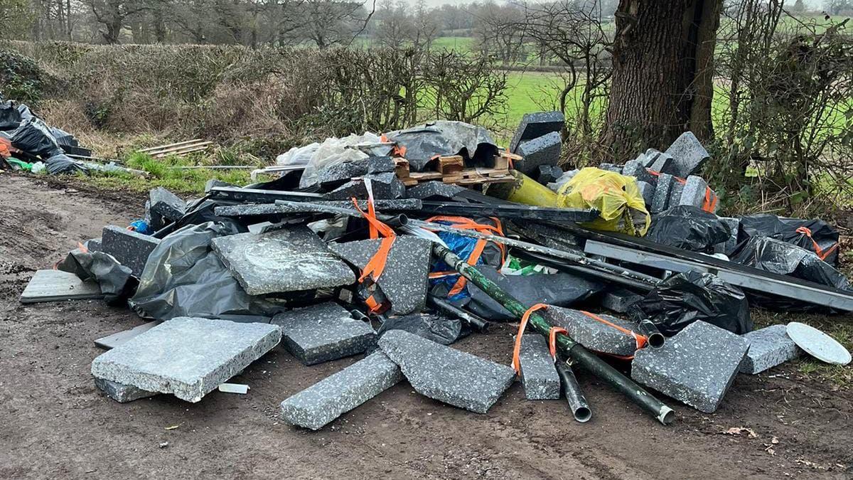 Rubbish dumped in a country lane