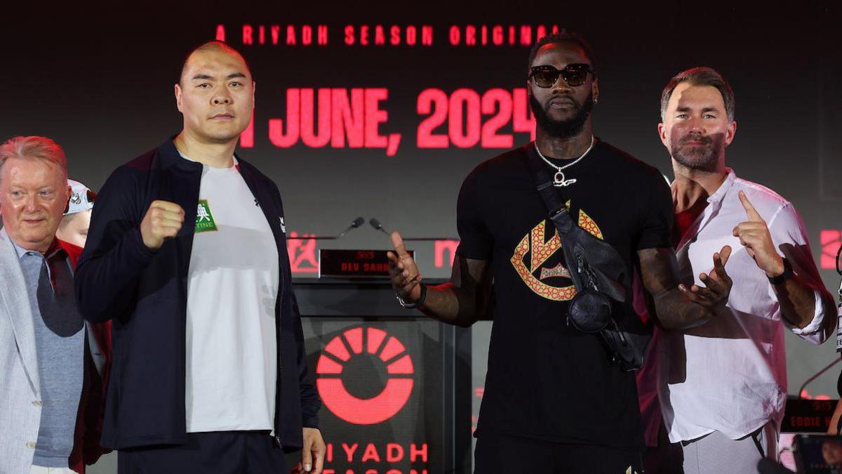 Frank Warren, Eddie Hearn, Zhilei Zhang and Deontay Wilder pose