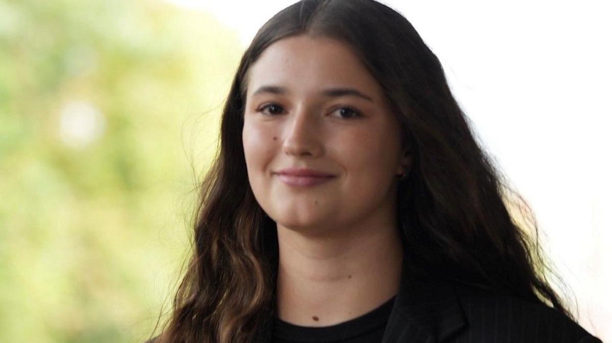 Karyna in professional attire