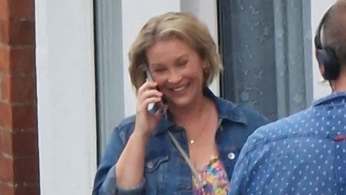 Joanna Page on set talking on the phone