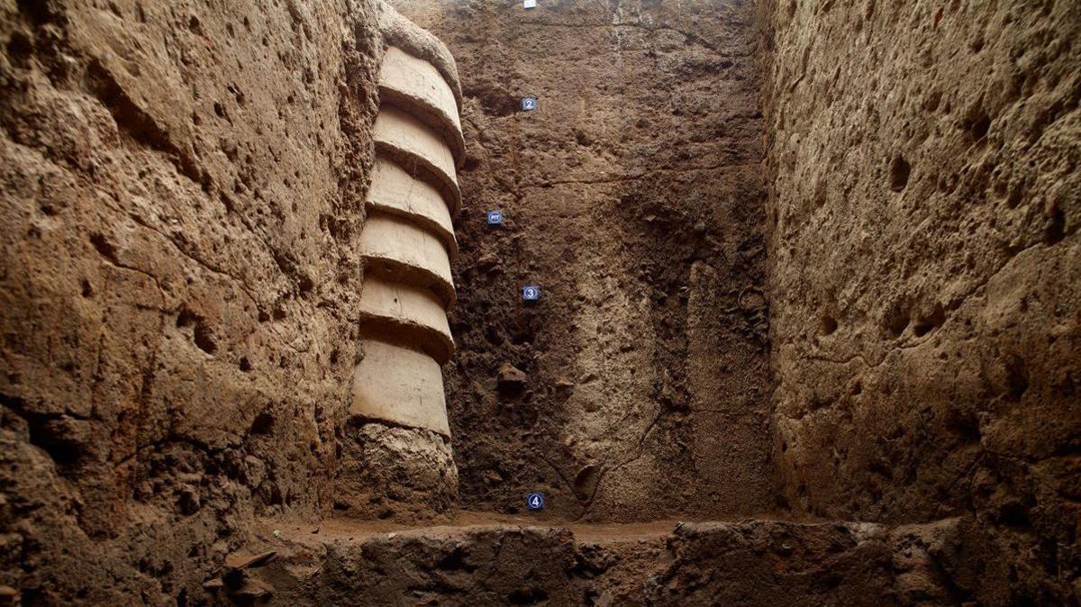 A terracota ringwell embedded in the soil in Keeladi in Tamil Nadu, India