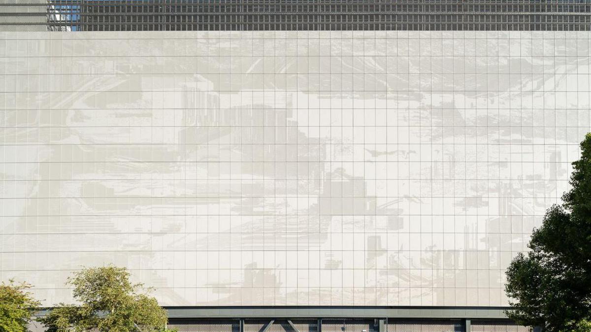 picture of the artwork, grey swirls, on the rectangular building in Park Royal
