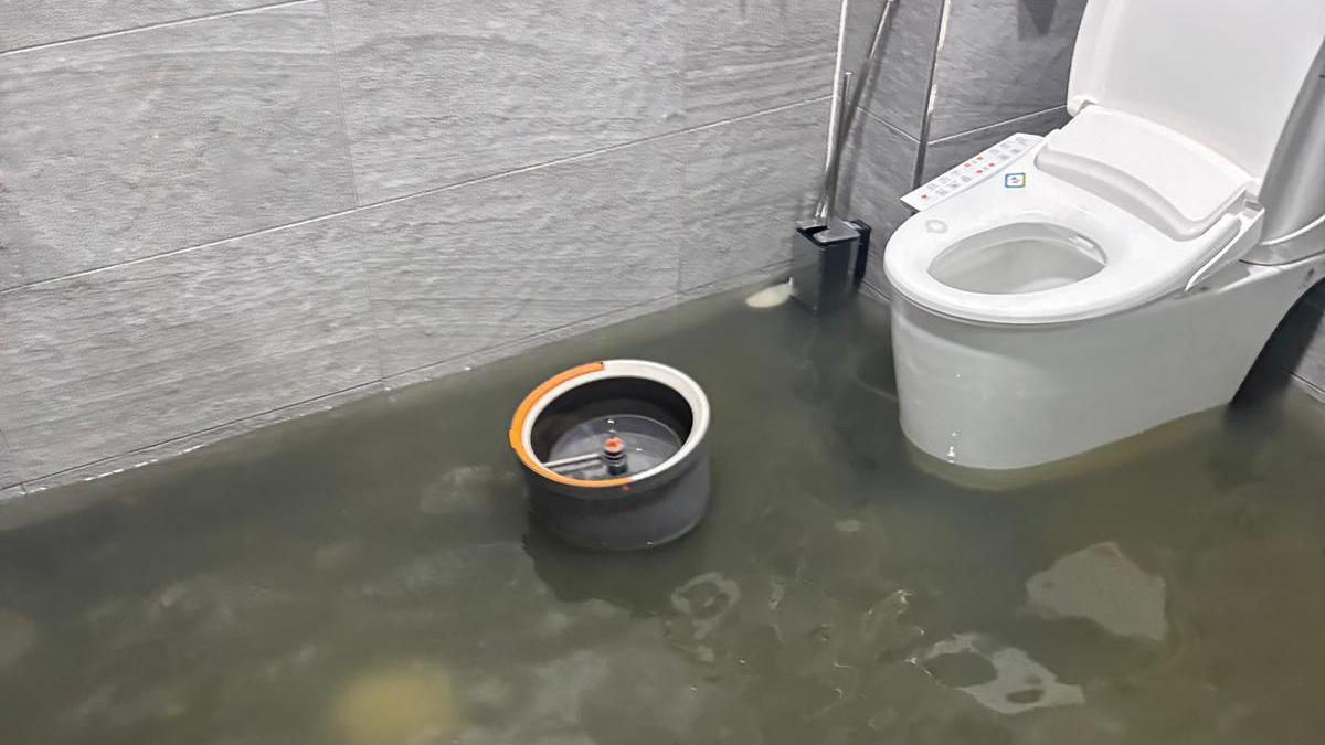 Floodwaters have inundated the toilet in Kim Ha-min's cafe in Gwangju