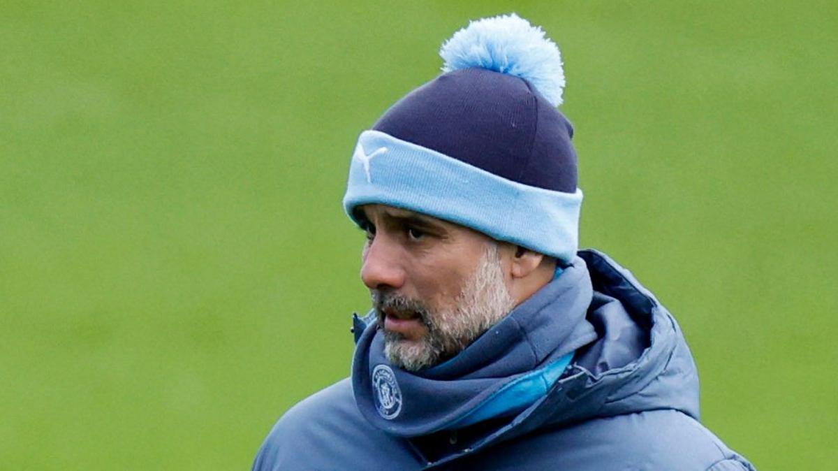 Coach Pep Guardiola at a Manchester City training session