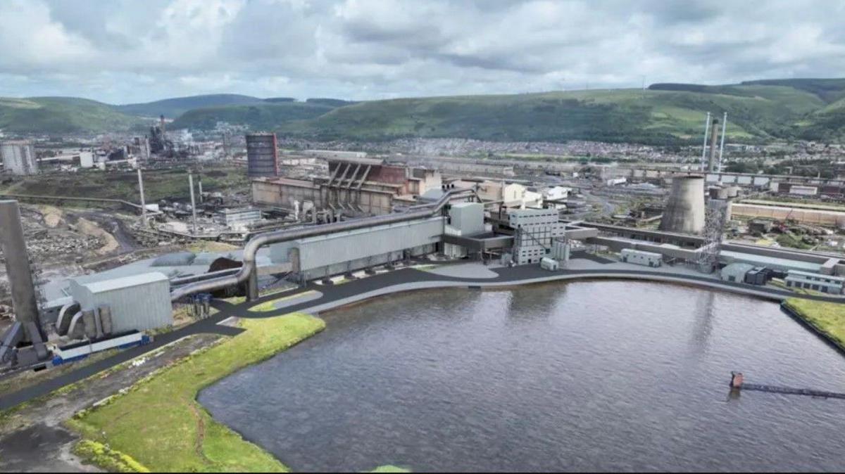 An artist's impression of a future industrial facility near a lagoon, showing large buildings, chimneys and storage tanks. The site is surrounded by green hills under a cloudy sky. It illustrates how the new electric arc furnace might look once operational.
