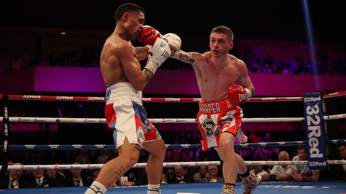 Ryan Garner throws a punch at opponent Salvador Jimenez 