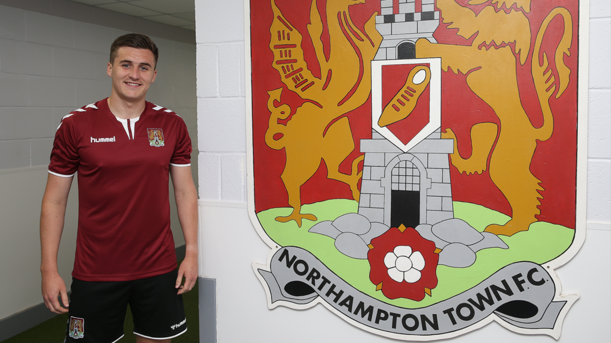 Aaron McGowan on the day he signed for Northampton Town in 2021