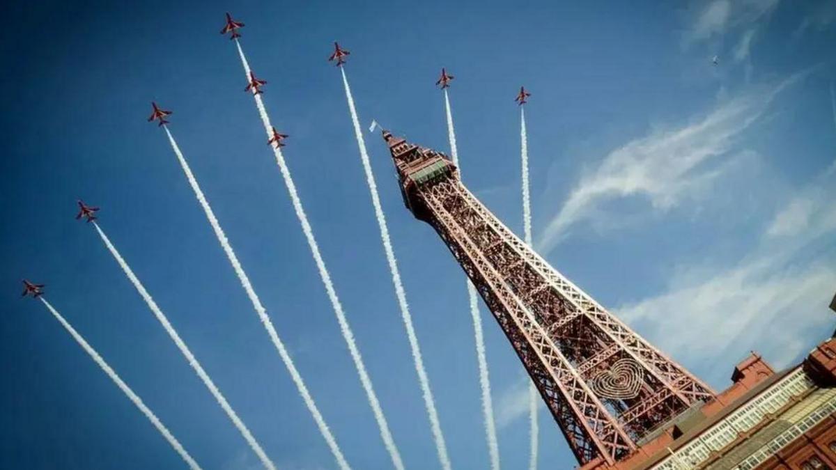 The Red Arrows flying over Blackpool Tower during their display at the Blackpool Air Show in August