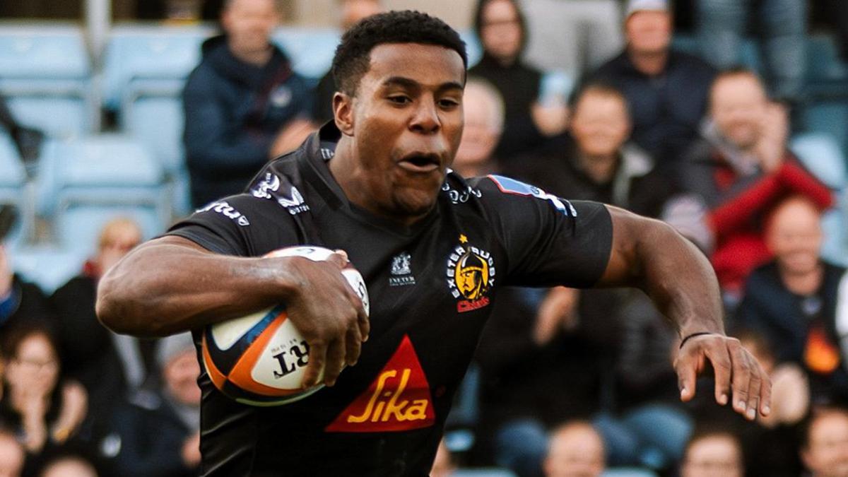 Immanuel Feyi-Waboso dives over for his hat-trick try for Exeter