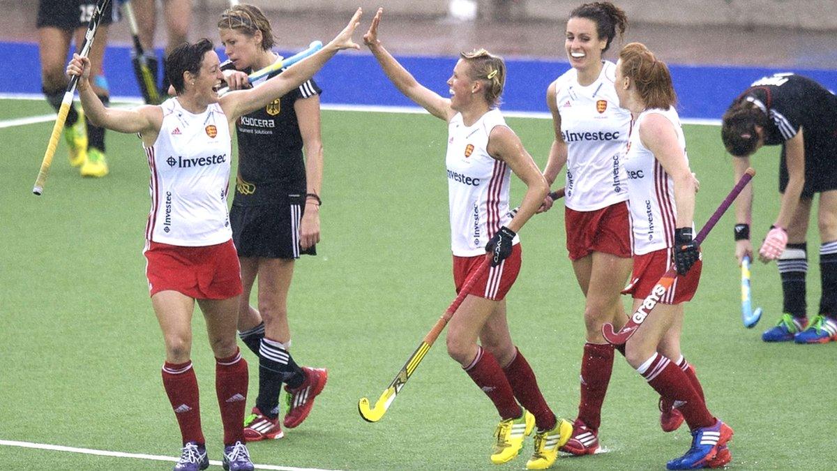 Alex Danson (centre) celebrates scoring against Germany