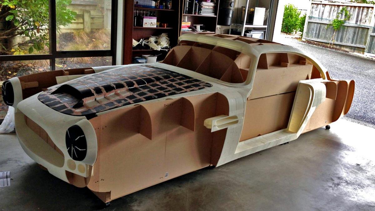 The shell of a 1961 Aston Martin is being painstakingly recreated