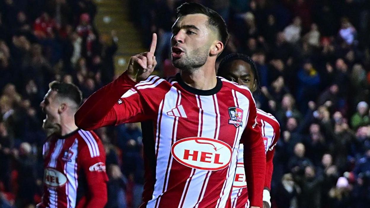 Reece Cole celebrates scoring Exeter City's opening goal