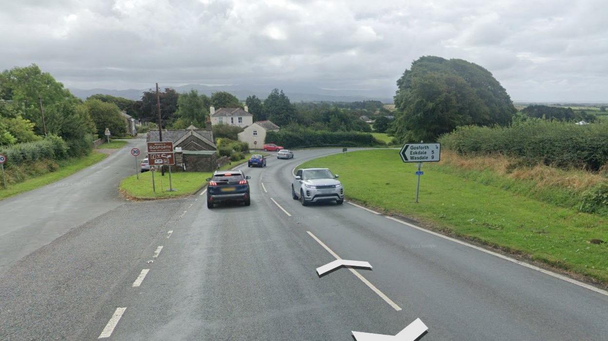 A595 road and entry road into Gosforth village