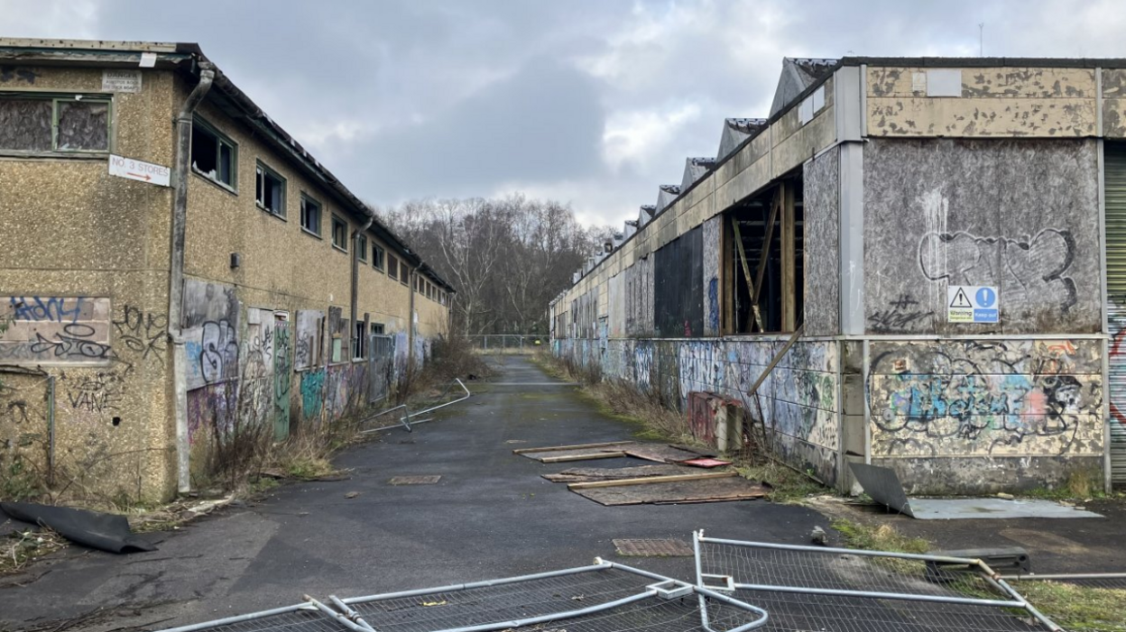 Two derelict buildings on the Saxonvale site with graffiti on them