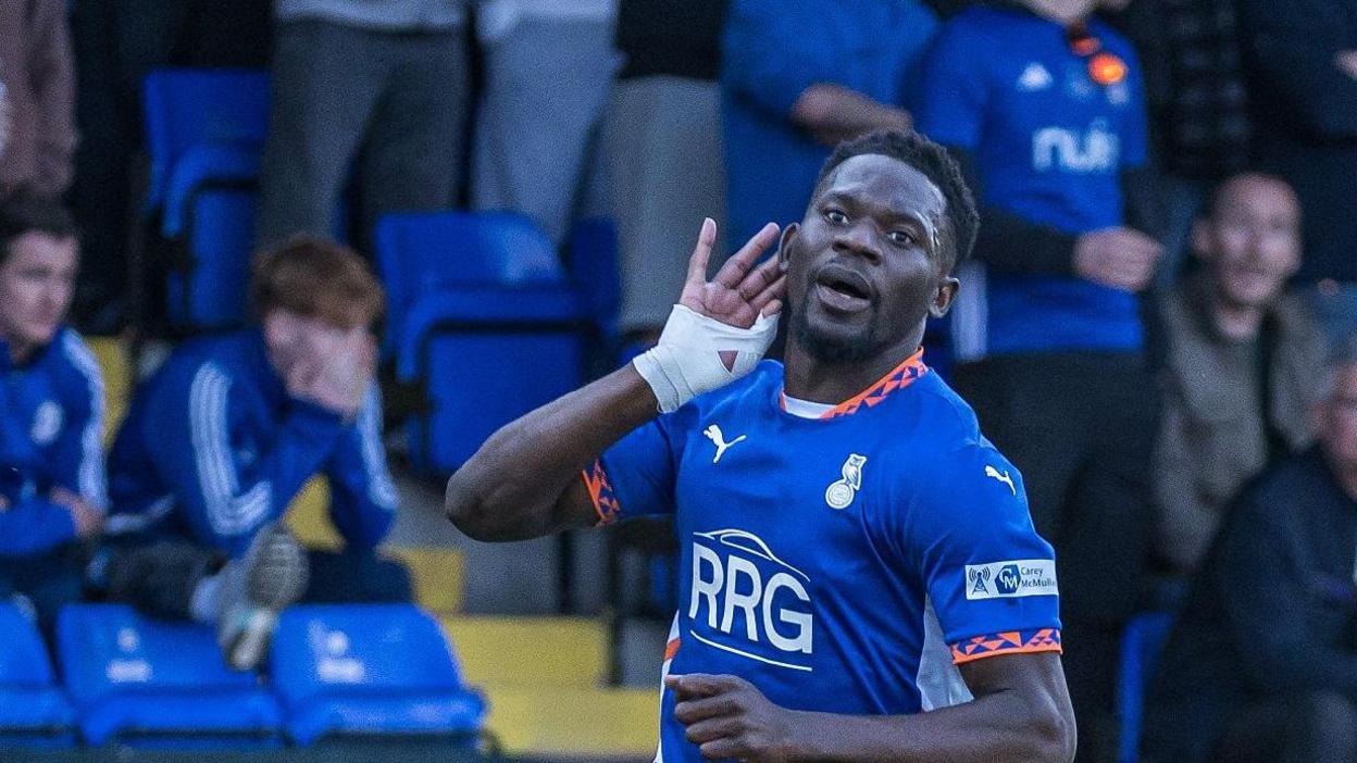 Mike Fondop celebrates scoring against Halifax