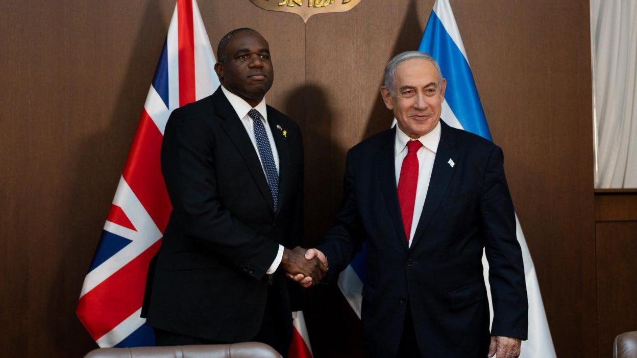 Foreign Secretary David Lammy shaking hands with Israeli Prime Minister Benjamin Netanyahu