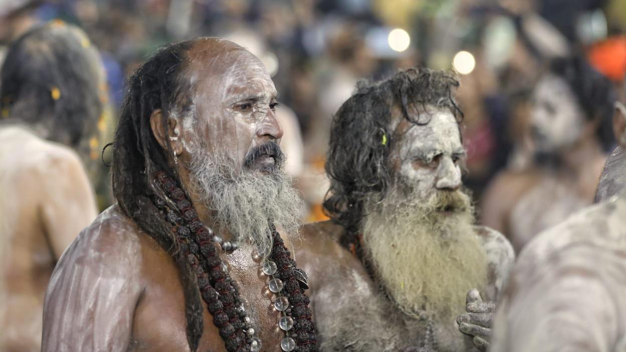 Ash-smeared naked Hindu holy men seen after the bathing ritual