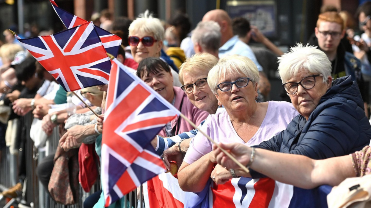 Crowds welcome King Charles to Belfast