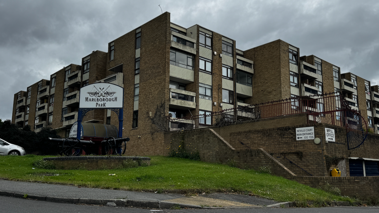 A block of flats with a sign reading Marlborough Park.