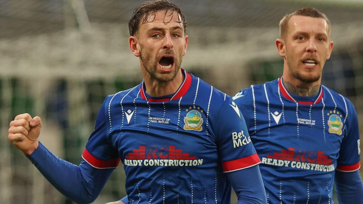 Matthew Fitzpatrick (left) celebrates after putting Linfield ahead against Coleraine