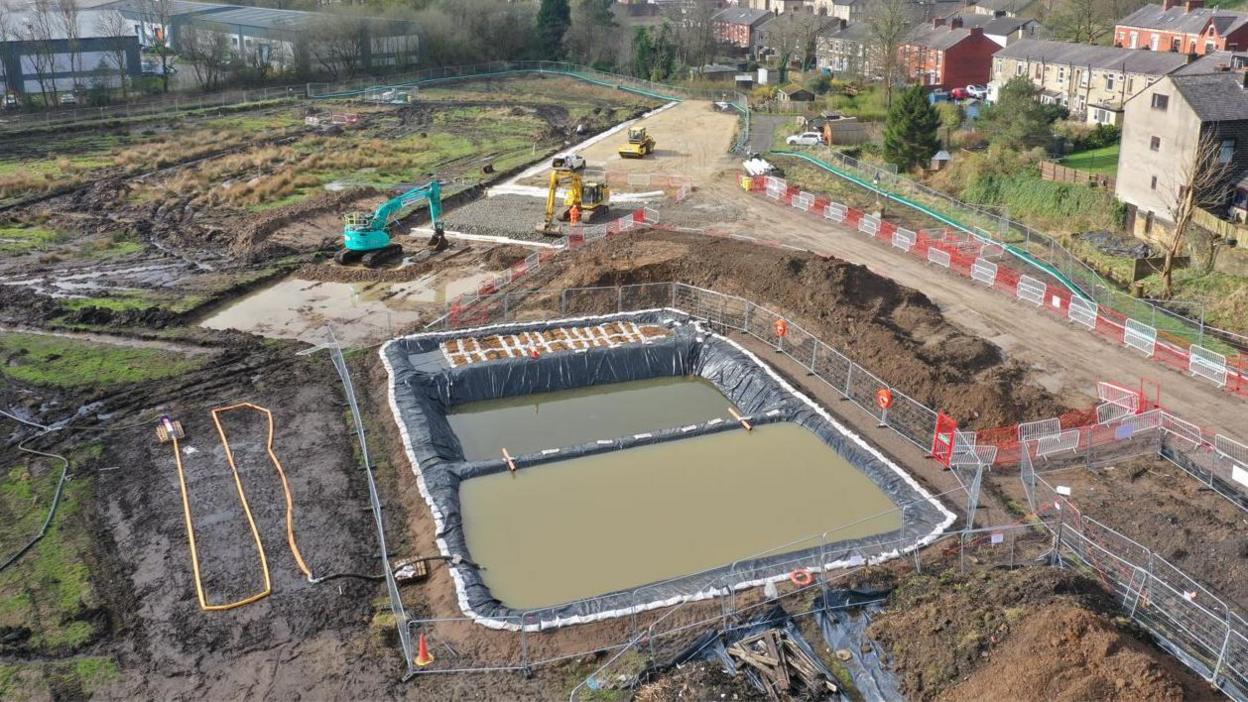 Aerial images of the progress on the flood defence scheme in Littleborough