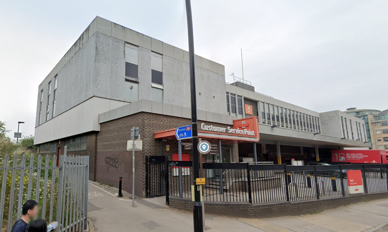 View of Roya Mail building from Leeman Road with cycle path running down left hand side