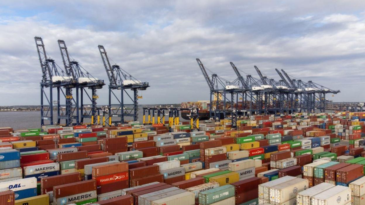 The Port of Felixstowe with cranes and shipping containers.