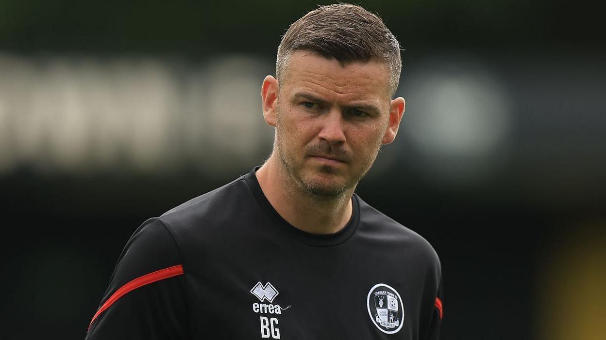 Crawley Town player Ben Gladwin before a match 