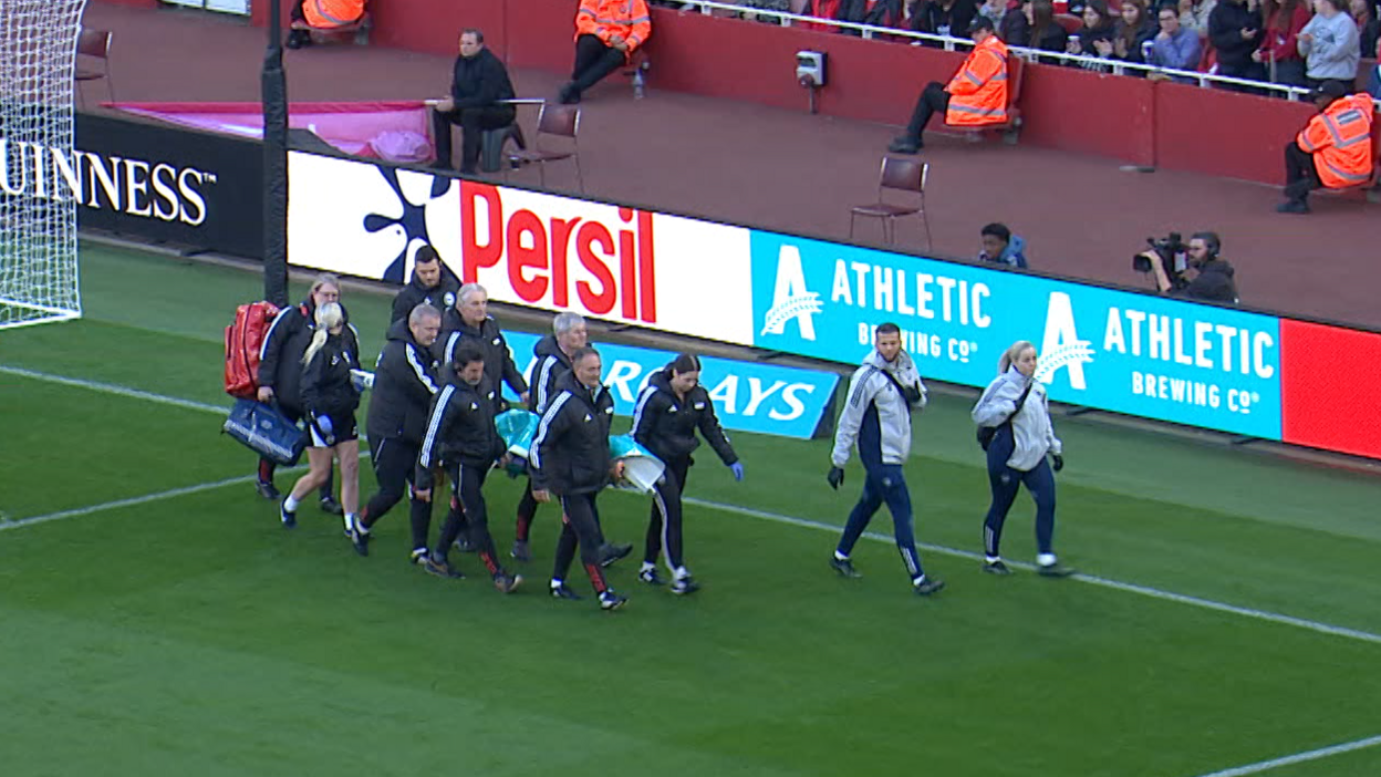 Maelys Mpome taken off the pitch on a stretcher