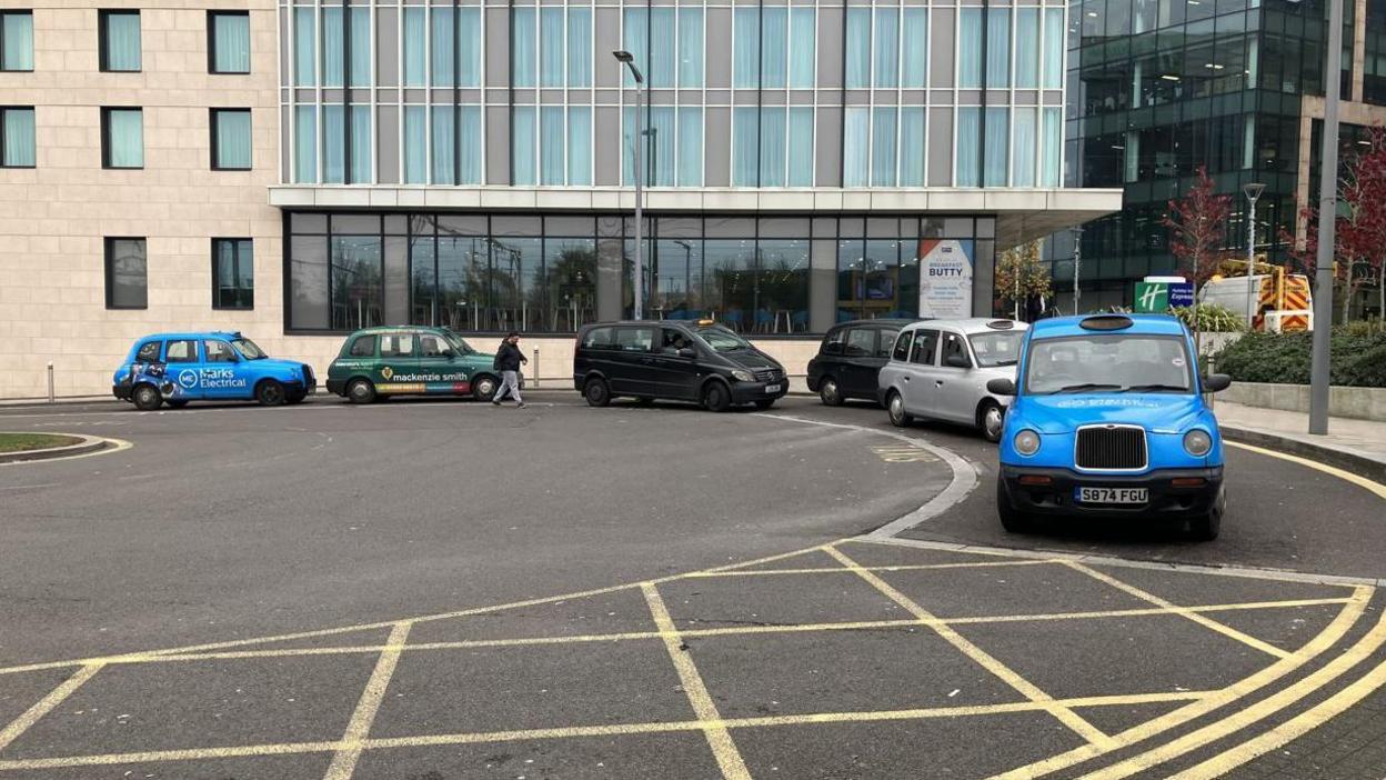 The taxi rank on Station Road outside Stockport train station