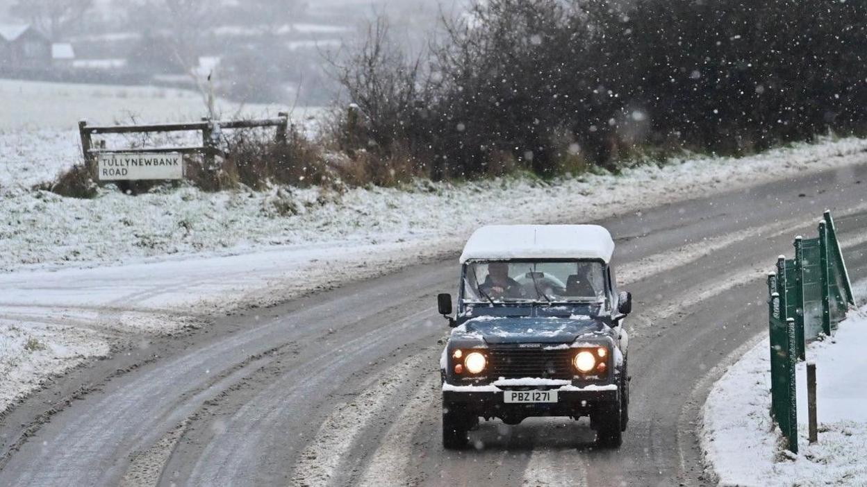 Vehicle on a snow-covered road