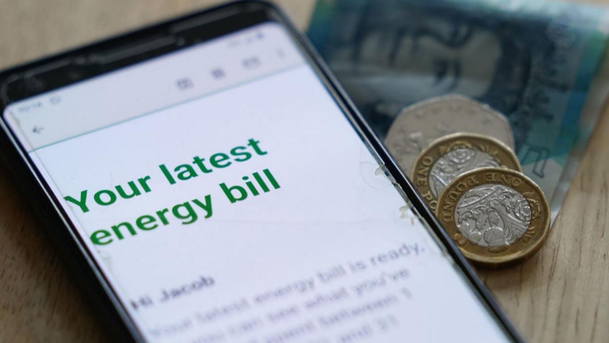 Mobile phone showing energy bill