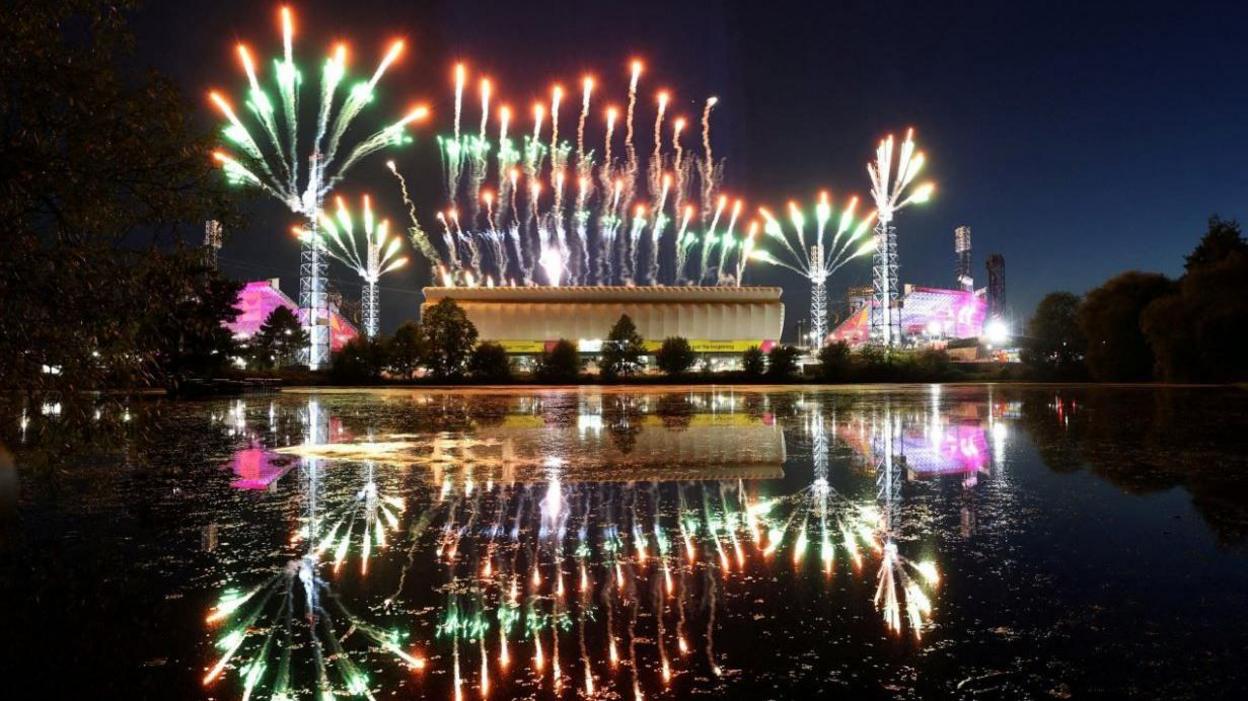 Fireworks at night during the Commonwealth Games closing ceremony seen outside Alexander Stadium, Birmingham, in August 2022