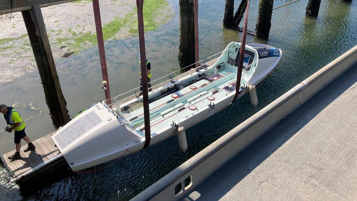 an aerial view of the empty rowboat, Saltie