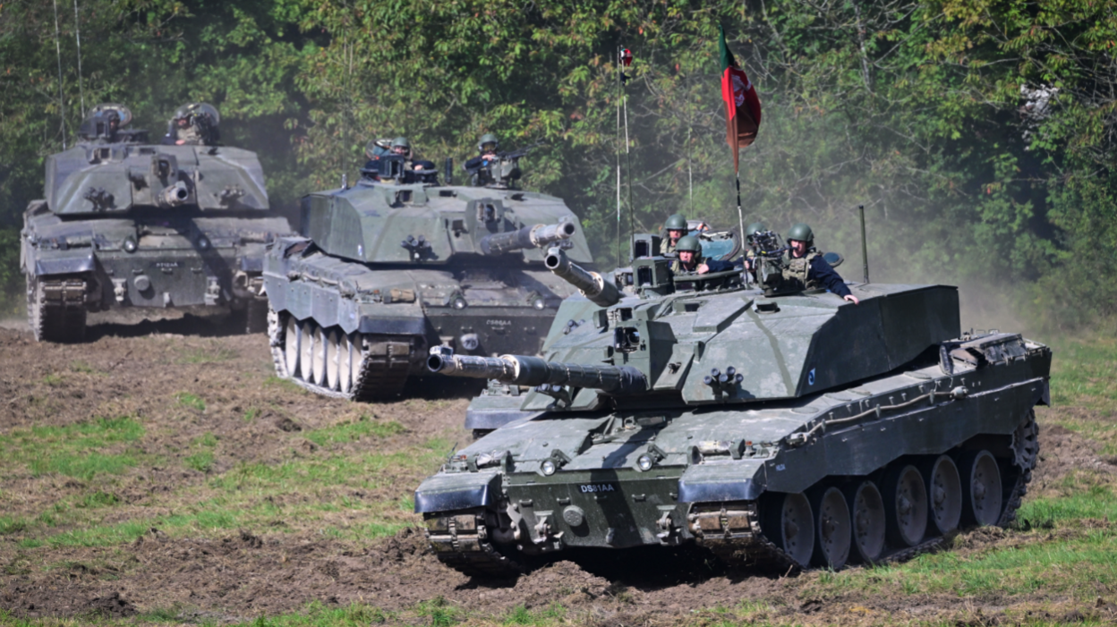 Challenger 2 main battle tanks are displayed for the families watching The Royal Tank Regiment Regimental Parade