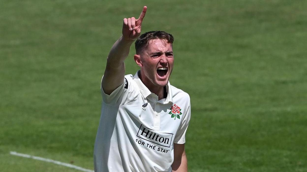 George Balderson takes a wicket for Lancashire