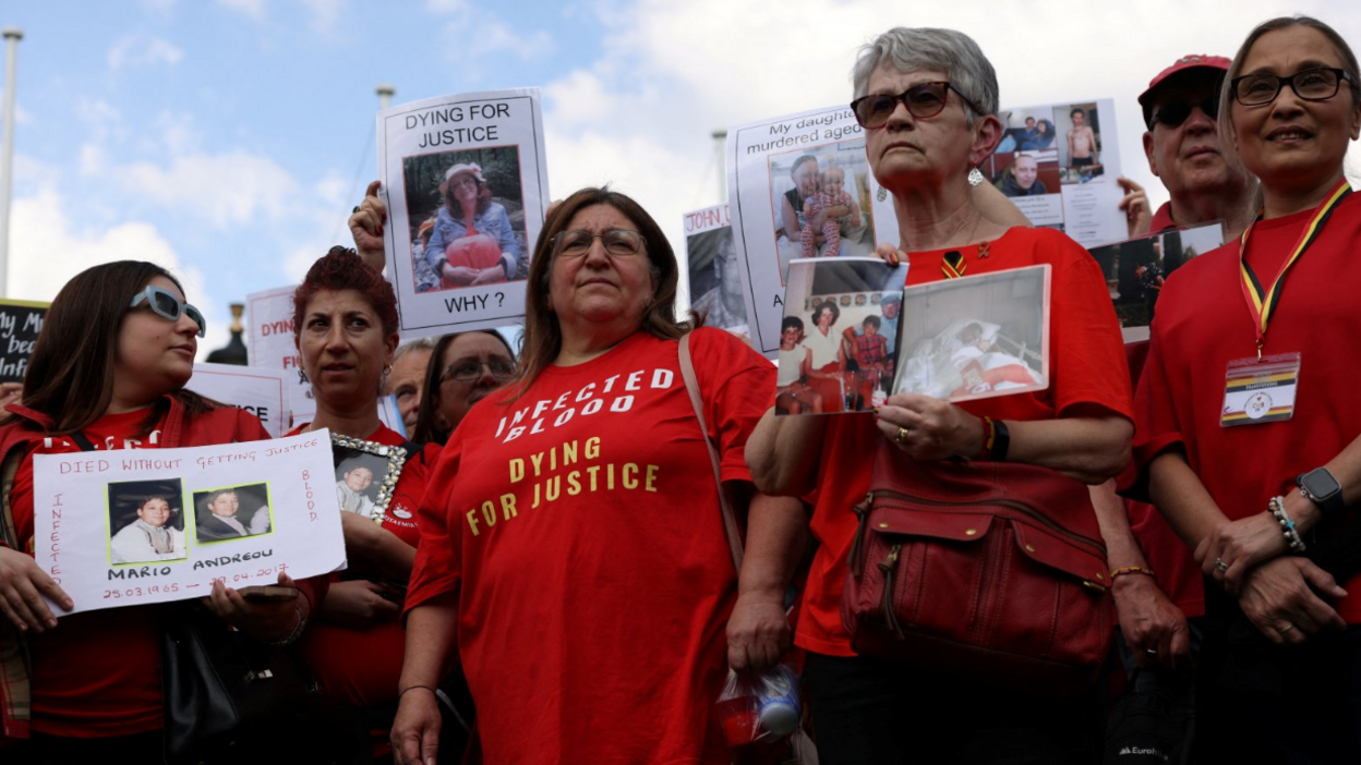 People affected by the contaminated blood scandal gather in Westminster for a vigil to remember those that lost their lives, ahead of the release of the final report of the Infected Blood Inquiry in May 2024