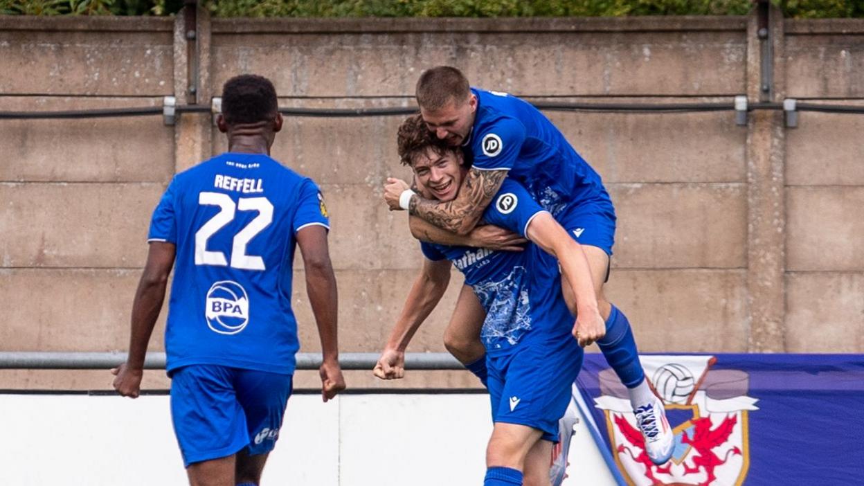 Penybont midfielder Gabe Kircough celebrates with his teammates