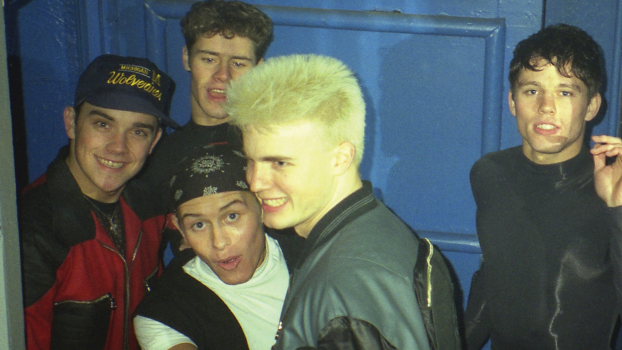 The five members of Take That pictured during the 1990s