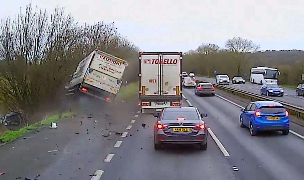 A screengrab from a picture of a box van crashing off the A34 southbound's lay-by near the Botley Interchange in Oxford, with traffic standing in the two lanes.