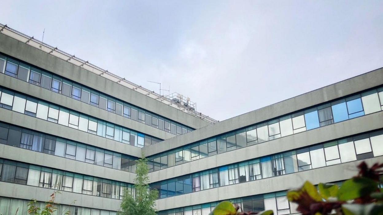 An image of Shirehall in Shrewsbury showing a number of floors, with some parts of the building at an angle to others  